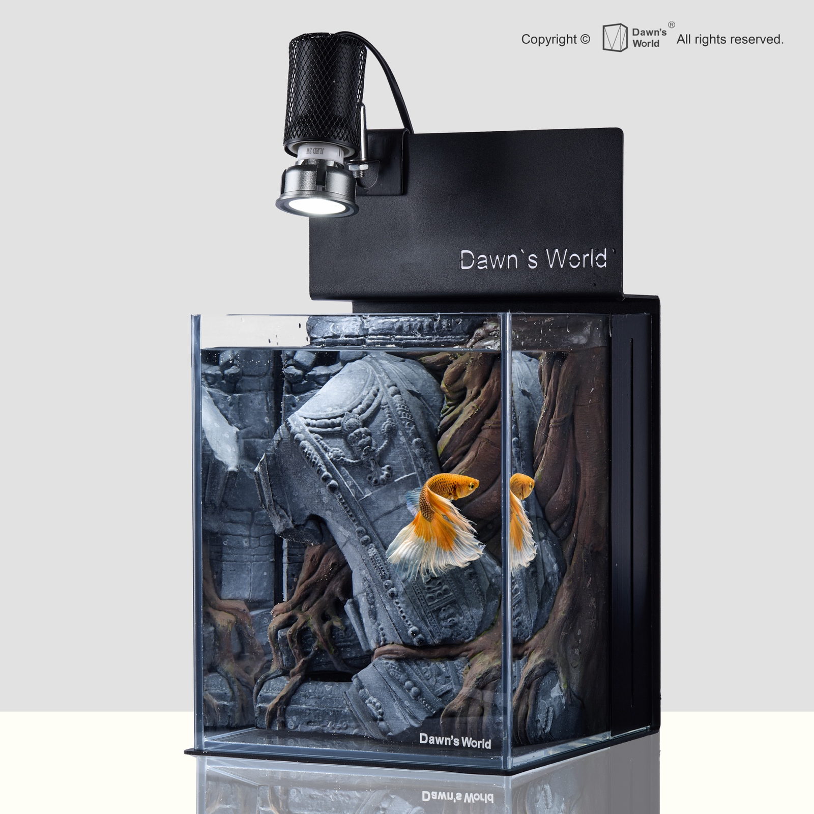 Angled view of Underwater Ruins Edition B showing the stone figure and root forms in depth, with two orange bettas near the centre of the tank.